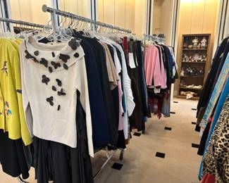 Hundred's of new with tag women's clothing pieces!  Great prices!