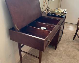 Mid century modern desk with pop up lid for storage underneath and three drawers