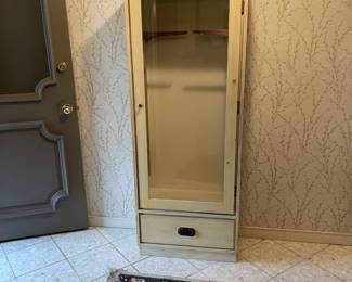 Blonde curio cabinet with glass shelves