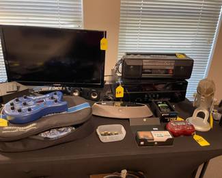 Lots of great audio equipment, including a microphone and stand.