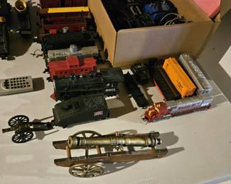 Model trains (S, O & HO) and accessories, plus cast iron toy cannons (items sold separately).