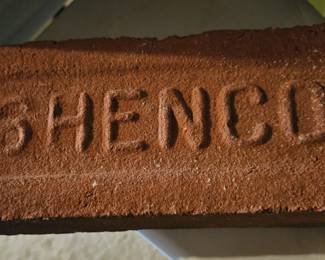 Possibly a brick from Memorial Stadium, but no paperwork.