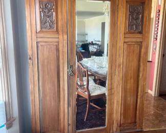 Armoire with shelving inside