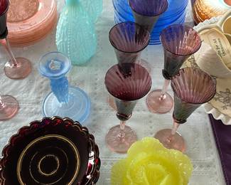 Ruby, turquoise lamp shades, purple wine glasses with pink stems, Portieux