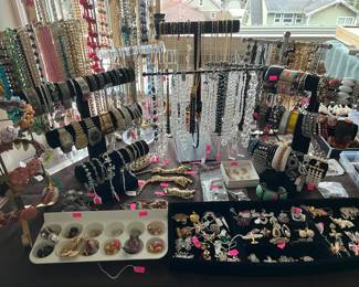 Lots of jewelry - mostly all vintage.  Rhinestones, sterling marcasite, 100s earring pairs, crystal, beads, signed pieces, rings