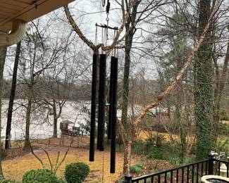 Outdoor chimes and tons of pots and planters. 