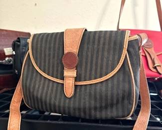 Purses, including Fendi, La Scala, Dooney & Bourke, and more