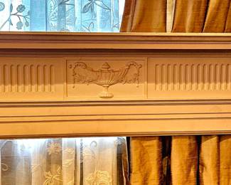 Detail of white fireplace