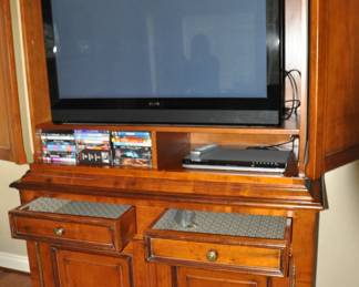 Media Unit Opens to Display 2 Compartments for Extra Electronics and a Large Flat Screen TV Section