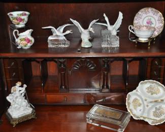 Miniature Waterford Crystal Houses, Paragon Tea Cup, an Antique Porcelain Courting Couple, a Val St. Lambert Trinket Box and a Limoges France Condiment Available.