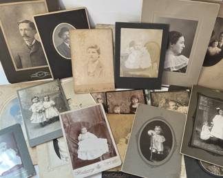 Antique cabinet black and white photos
Children, staged infant, ? Post mortem?