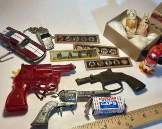 Vintage toy lot, toy guns, caps, cars, army whistle, magic lantern glass slides, micky mouse bubble pipe