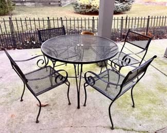 Five piece wrought iron patio set