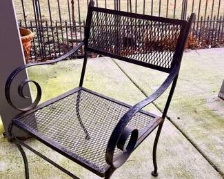 Five piece wrought iron patio set