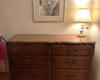 This is the other dresser, of a completely different style.  Of course, let's not forget about the lamp or framed art.  It looks like a Degas.