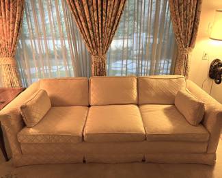 This white sofa is available (the light is somewhat warm).