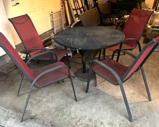 This patio set is all metal except for the seat coverings. 