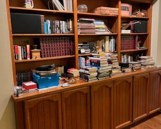 Come see this wonderful built-in bookshelf and ALL its books and magazines.
