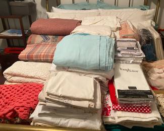 Assorted Bedding/Brass Bed is not for sale