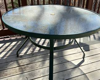 Green metal patio table