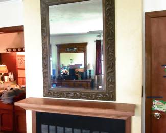 One of three large wall mirror, some are beveled..