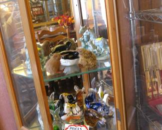 Numerous animal figurines.