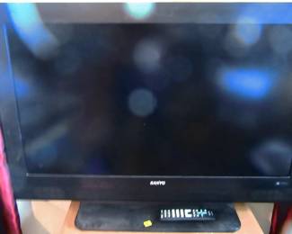 27 Inch working television with remote control.