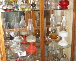 Small collection of oil lamps, sold separate.