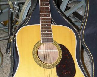 Alvarez classic guitar with soft carrying case.