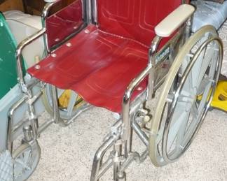 Adult wheelchair with footrest.