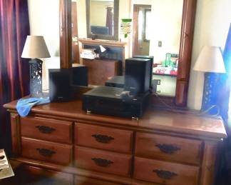 Modern 9 drawer chest/dresser with very nice mirror.