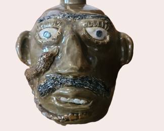 Face jug folk art potter by Jerry Brown, Hamilton Alabama.