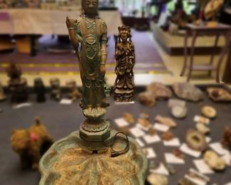 Quan Yin Goddess Statue Foundation works Background is a Quan Yin Statue