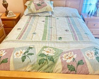 Queen size bed with mattress, dresser, and end tables