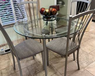 Glass top dining room table and chairs