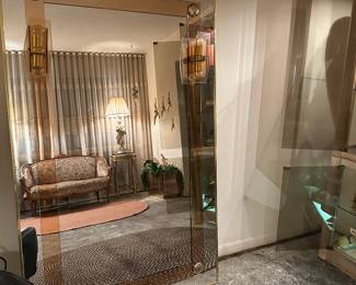 Unique Lighted Hall Mirror  with Rose Gold accents. Very Heavy bring Help to Move ! 