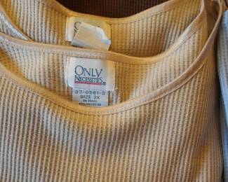 We have dozens of comfy cozy woman's tops in plus sizes 2X and 3X in a variety of colors - only $2.00 each!