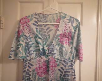 Bodice detail of satin Vanity Fair vintage nightgown with a deep v-neckline and short sleeves, Size 36