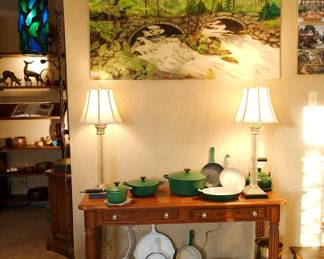 Another picture of the over a dozen pieces of Le Creuset (most appears to have never been used) 