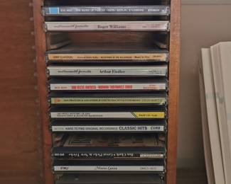 Music CDs including: Doris Day, Mario Lanza, Roy Clark, Hard to Find Original Recordings Classic Hits, Nelson Eddy and Jeanette MacDonald, God Bless American: Mormon Tabernacle Choir, Arthur Fiedler, NPR: Milestones of the Millennium Music in Film, Roger Williams, The Music of Foster: Kern: Berlin/Steinberg, The Best of the Great American Composers: Volume IV, The Best of the Great American Composers: Volume I