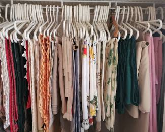 Closet full of various table linens and runners, both regular and holiday themed