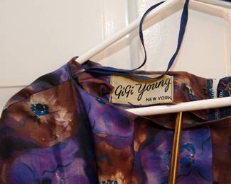 Tag detail of vintage Gigi Young New York brown and purple floral print midi a-line dress with 3/4 sleeves