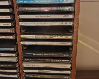 Music CDs including: Rosemary Clooney, Kathryn Grayson, The Best Opera Choirs, Piano by Candlelight, Moonlight Piano, Mantovani Orchestra, Henry Mancini, Billboard Pop Memories: 1930s, Top Movie Hits: 1950-54, THe Very Best of the Platters, Johnny Mathis, Big Bands: Artie Shaw, Big Bands: Glenn Miller