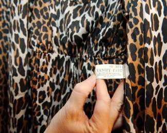 Label in the Vintage Vanity Fair robe in a leopard print, size medium