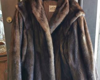 Gorgeous vintage oversized rich brown fur jacket featuring wide sleeves by Keim Furs Chicago Illinois, perfect to achieve that vintage mob boss wife aesthetic