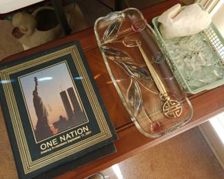 Crystal prisms, brass oriental letter opener, and one of the hundreds of books we have at this sale!