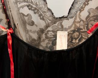 Chevette tag (size 34) in the black spaghetti strap nightgown with pink accent ribbons