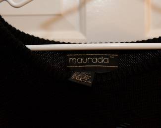 Tag detail of lovely vintage Maurada black oversize sweater with asymmetrical rhinestone detail radiating from the left shoulder