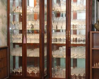 Pair of Howard Miller Locking Lighted Display Cabinets