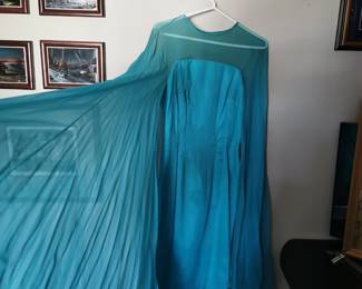 The drama sleeve detail of stunning bright blue 1960s swing dress with DRAMATIC sheer sleeves 